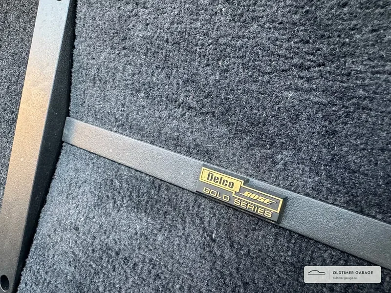 Эмблема аудиосистемы Delco-Bose Gold Series